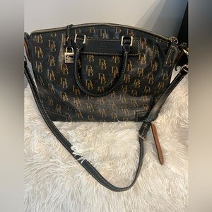 Dooney an Burke leather bag. Has plenty of room on the inside with a pocket.